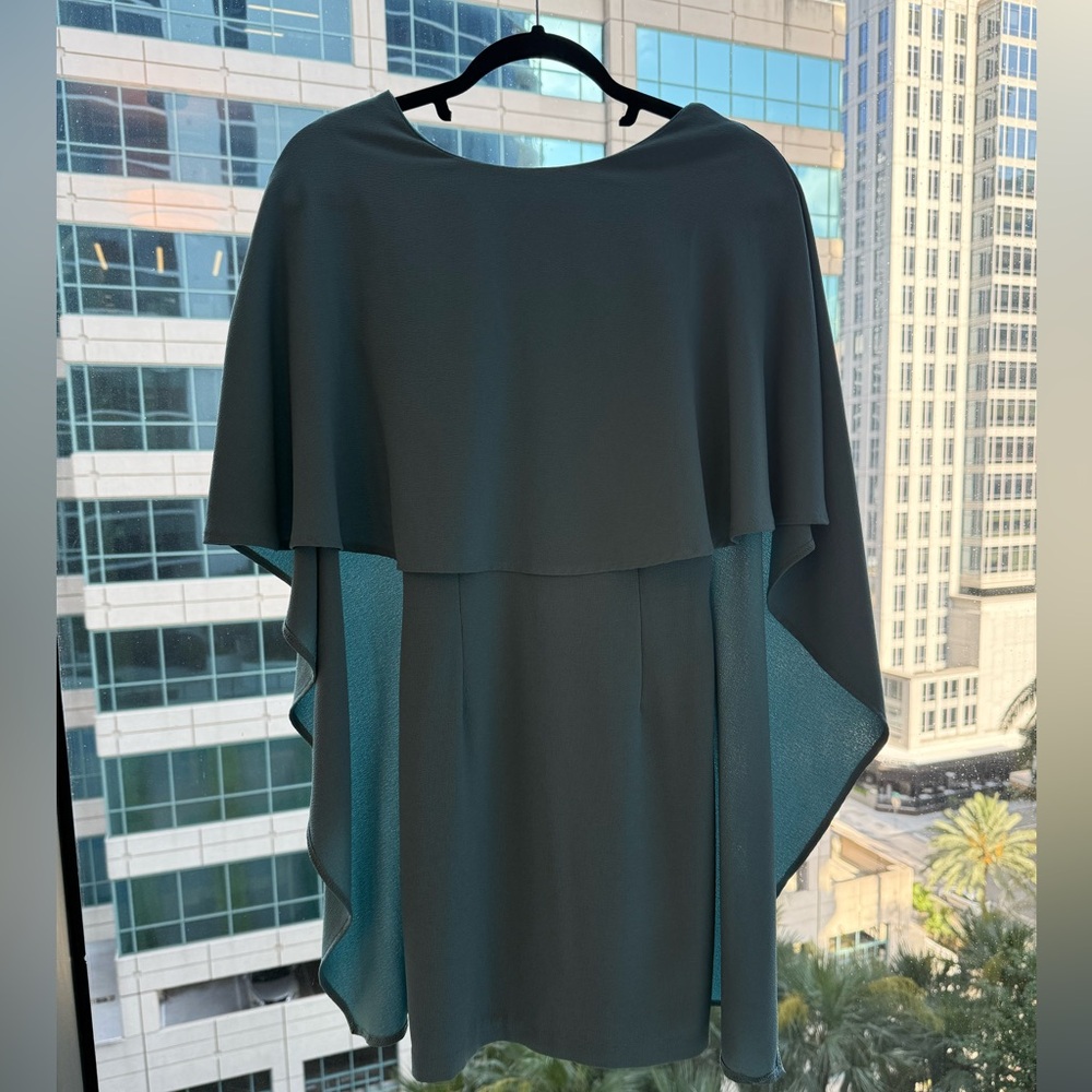 Beautiful light turquoise dress. So classy